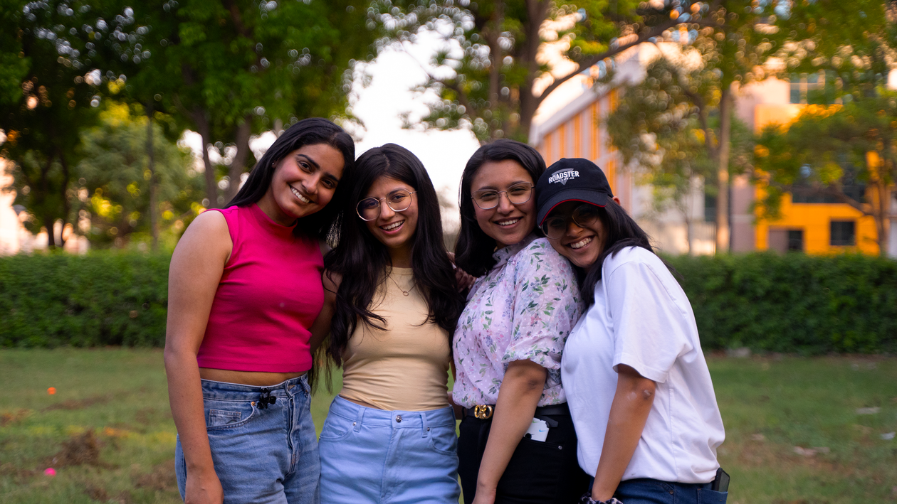 Four Indian students outdoors